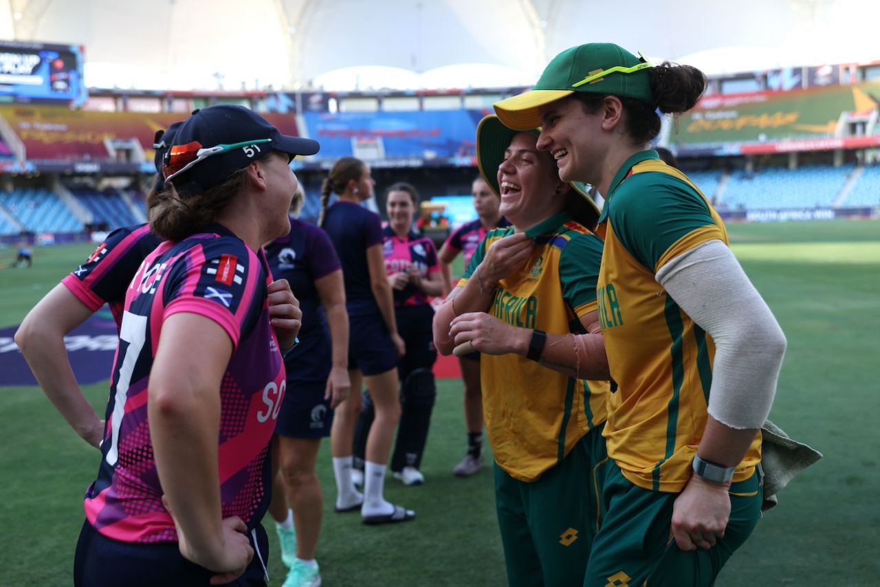The two sets of players catch up after the game, Scotland vs South Africa, Women's T20 World Cup, Dubai, October 9, 2024