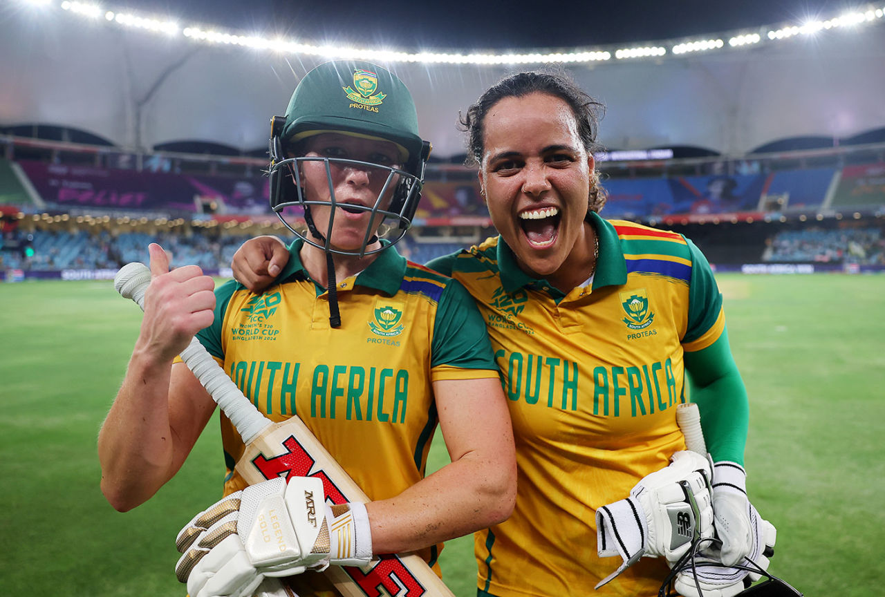Chloe Tryon embraces Anneke Bosch as they walk off after victory, Australia vs South Africa, semi-final, Dubai, Women's T20 World Cup, October 17, 2024