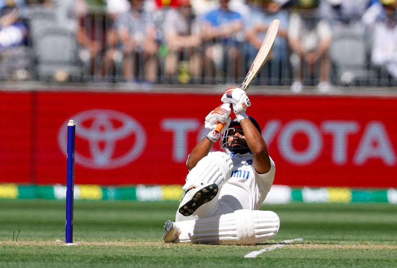 Rishabh Pant ends up on the floor as he scoops a full delivery over deep backward square, Australia vs India, 1st Test, Perth, 1st day, November 22, 2024