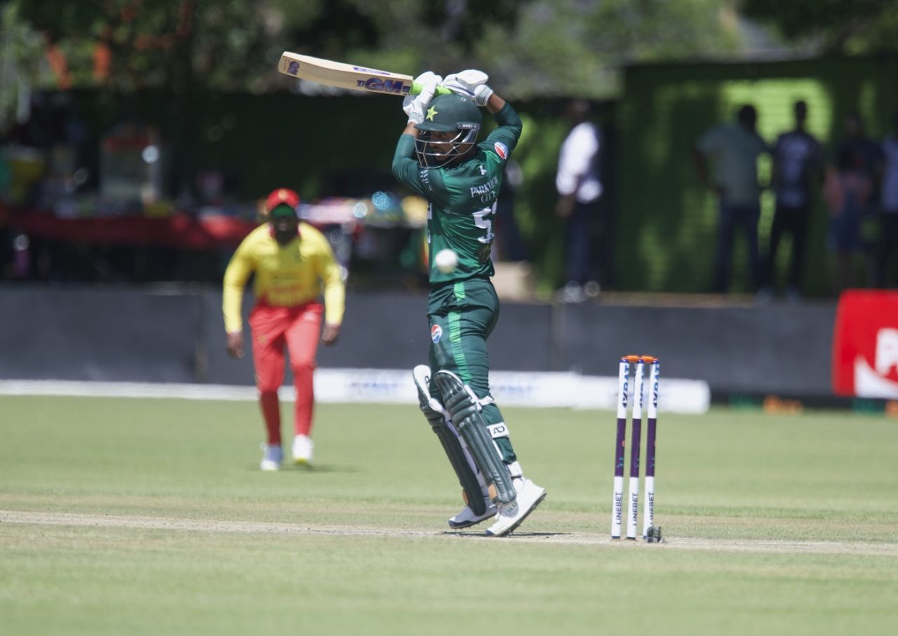Saim Ayub punches the ball away with a high elbow, Zimbabwe vs Pakistan, 1st T20I, Bulawayo, December 1, 2024