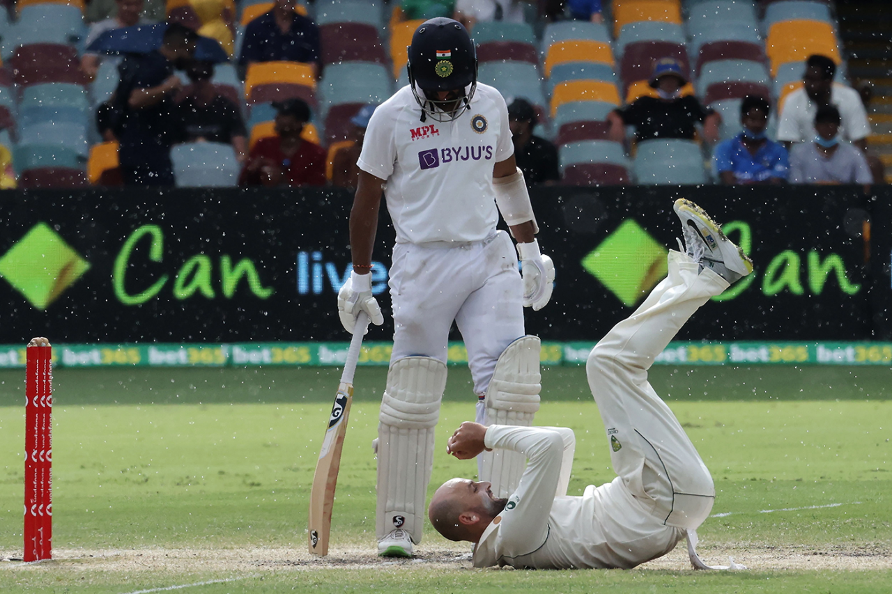 Cheteshwar Pujara looks down at a diving Nathan Lyon on the pitch, Australia vs India, 4th Test, Brisbane, 5th day, January 19, 2021