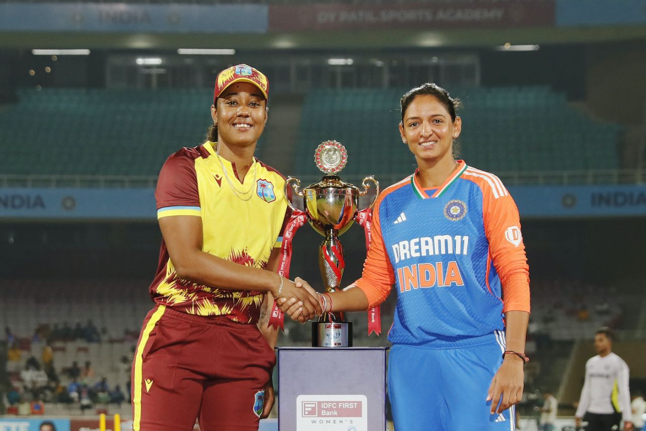 Hayley Matthews and Harmanpreet Kaur pose with the T20I series trophy, India vs West Indies, 1st Women's T20I, Navi Mumbai, December 15, 2024