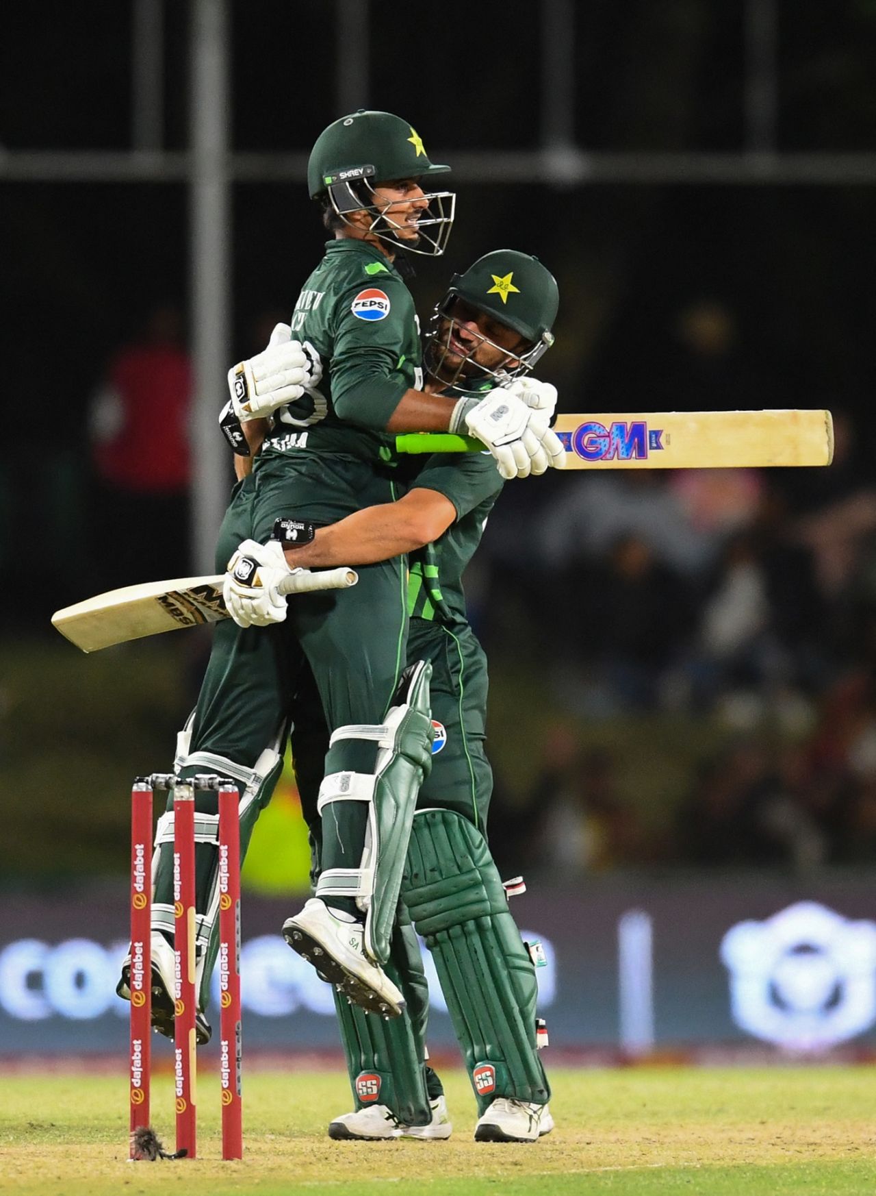 Saim Ayub and Salman Agha embrace after Ayub reached his hundred, South Africa vs Pakistan, 1st ODI, Paarl, December 17, 2024