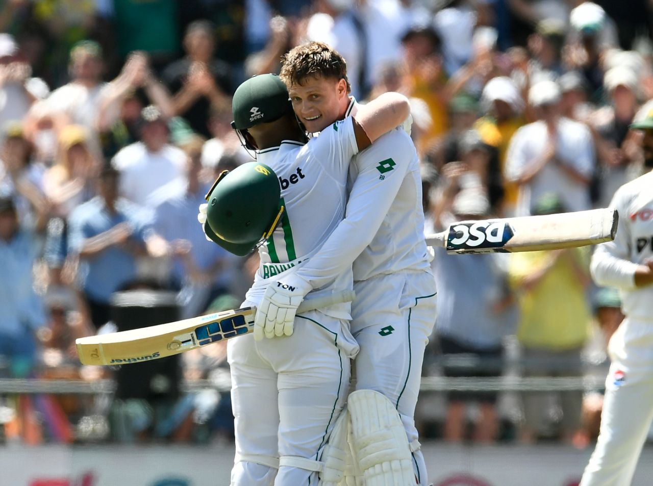 Ryan Rickelton gets a hug from Temba Bavuma after reaching his century, South Africa vs Pakistan, second Test, Cape Town, January 3, 2025