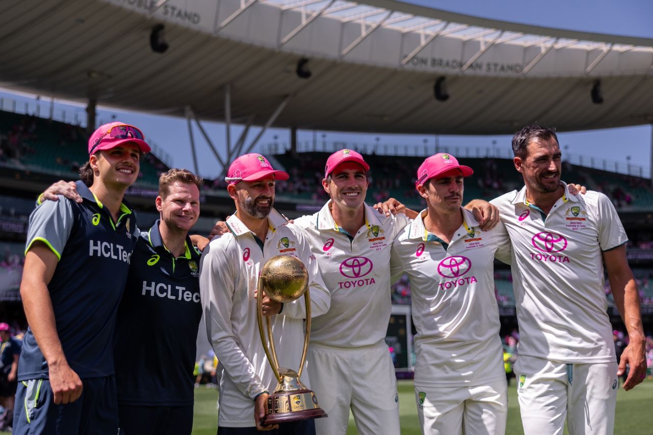 Nathan Lyon keeps a tight grip on the trophy as he poses with his team-mates, Australia vs India, 5th Test, Sydney, 3rd day, January 5, 2024