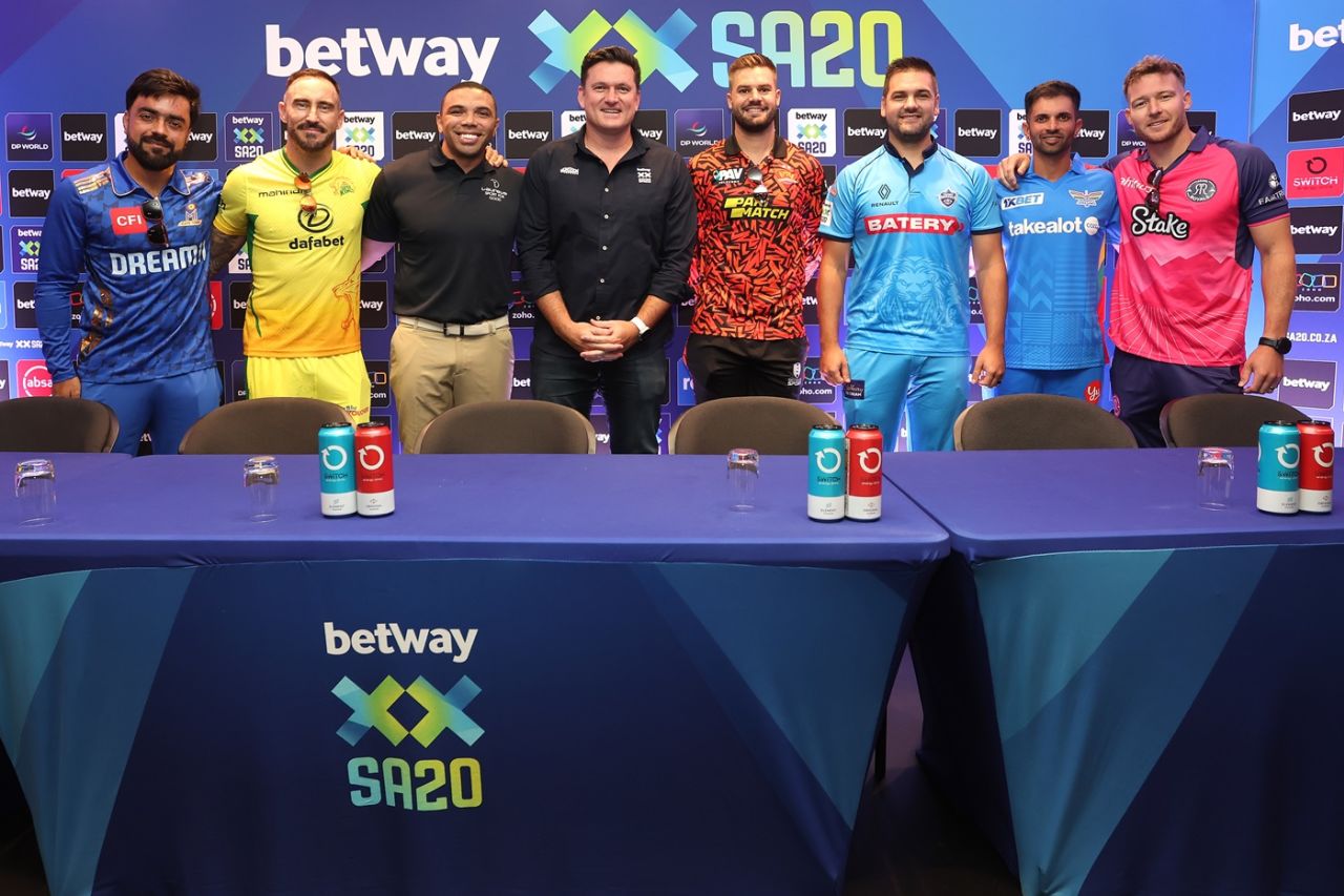 Rashid Khan, Faf du Plessis, Aiden Markram, Rilee Rossouw, Keshav Maharaj and David Miller pose with SA20 league commissioner Graeme Smith, Cape Town, January 8, 2025