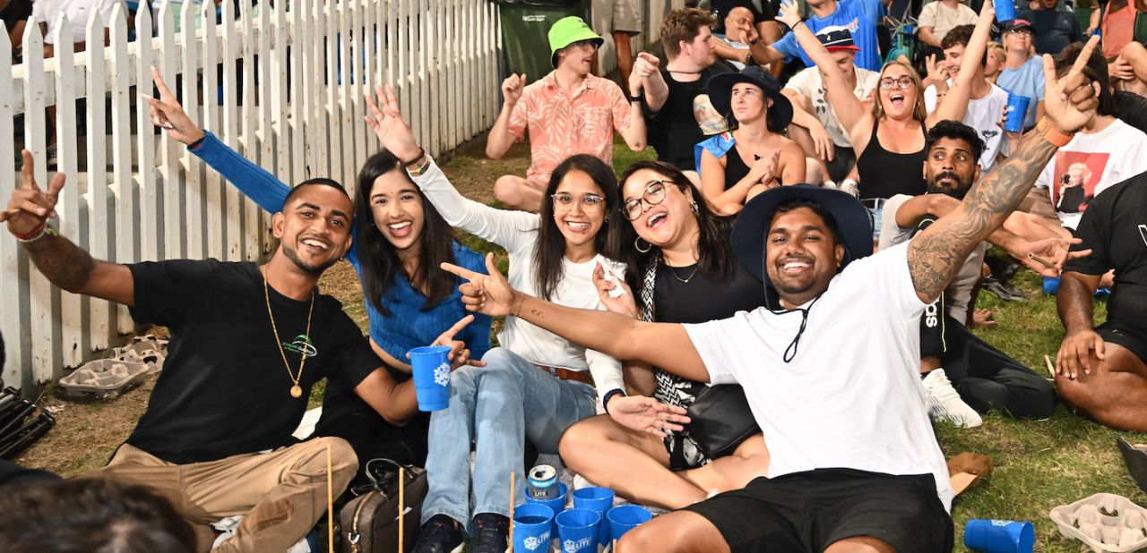 A group of fans on the Kingsmead grassbanks pose collectively, Durban's Super Giants vs Pretoria Capitals, SA20 2025, Durban, January 10, 2025