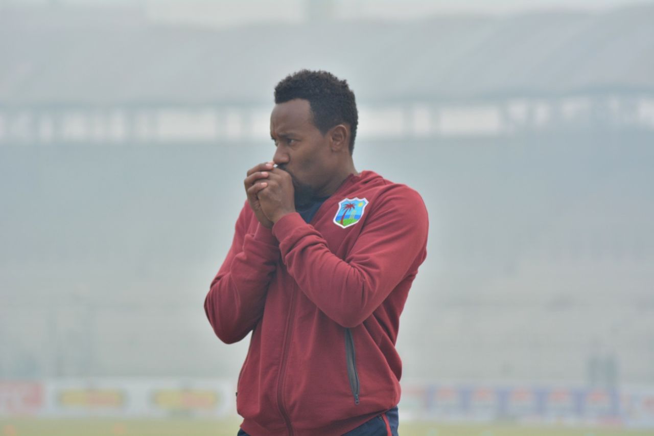 Kavem Hodge keeps himself warm, Pakistan vs West Indies, 1st Test, day one, Multan, January 17, 2025