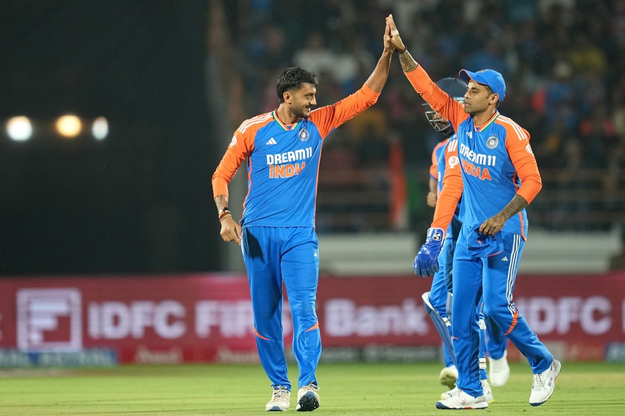 Axar Patel celebrates a wicket with Suryakumar Yadav, India vs England, 3rd T20I, Rajkot, January 28, 2025