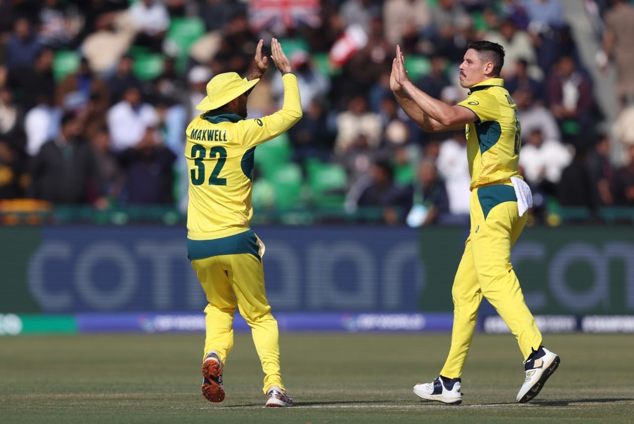 Glenn Maxwell joins Ben Dwarshuis in celebrating the latter's second wicket, Australia vs England, ICC Champions Trophy 2025, Lahore, February 22, 2025