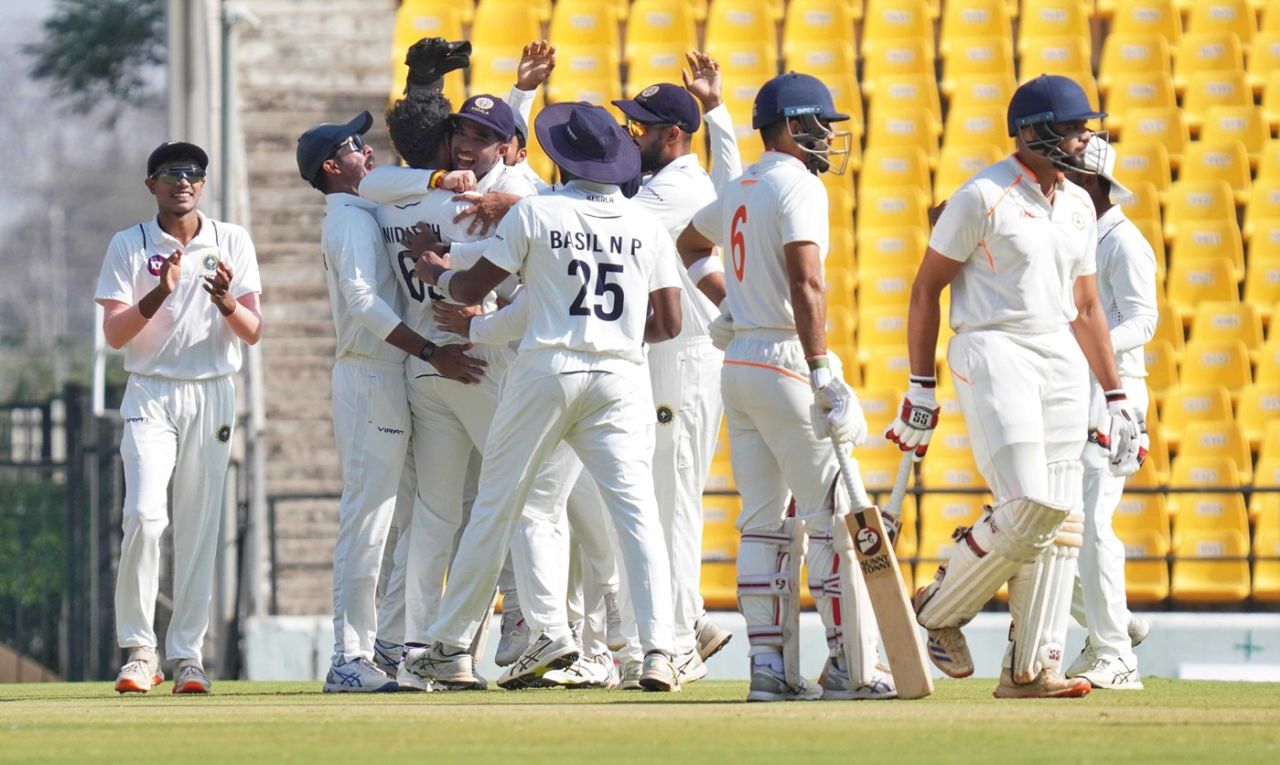MD Nidheesh is mobbed by his Kerala team-mates after striking with the second ball of the Ranji Trophy final, Vidarbha vs Kerala, Ranji Trophy 2024-25 final, day 1, Nagpur, February 26, 2025