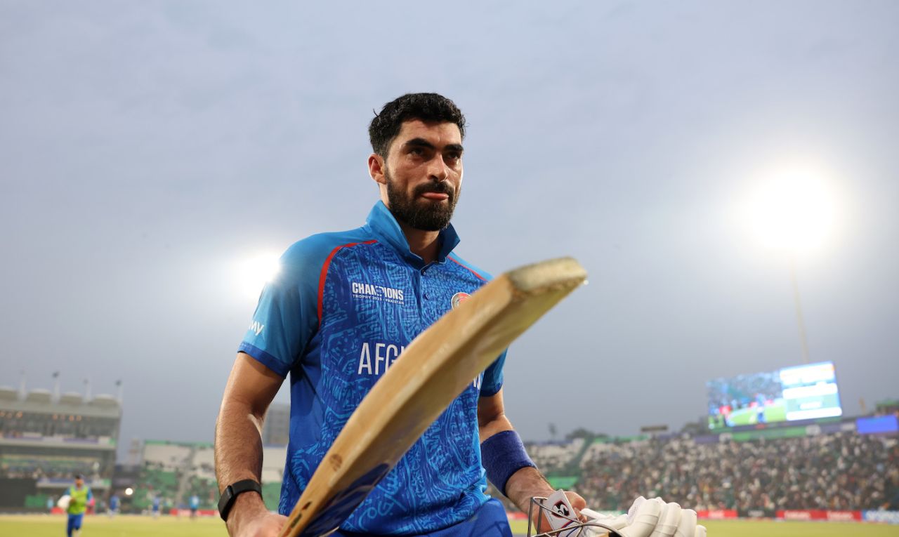 Ibrahim Zadran walks back after making a record-breaking 177, Gaddafi Stadium, Lahore, ICC Champions Trophy, February 26, 2025