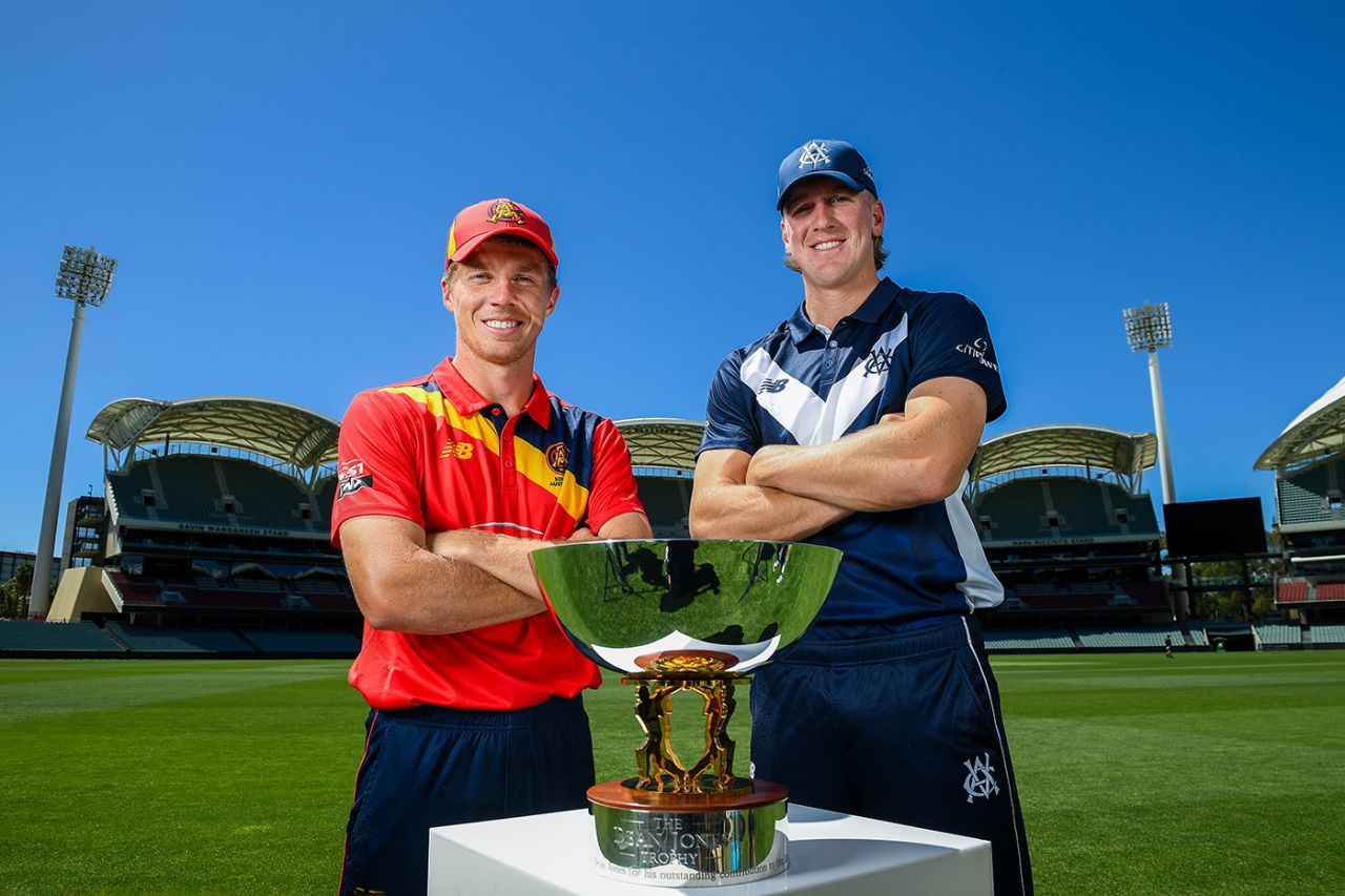 Nathan McSweeney and Will Sutherland pose with the Dean Jones Trophy, Adelaide, February 28, 2025