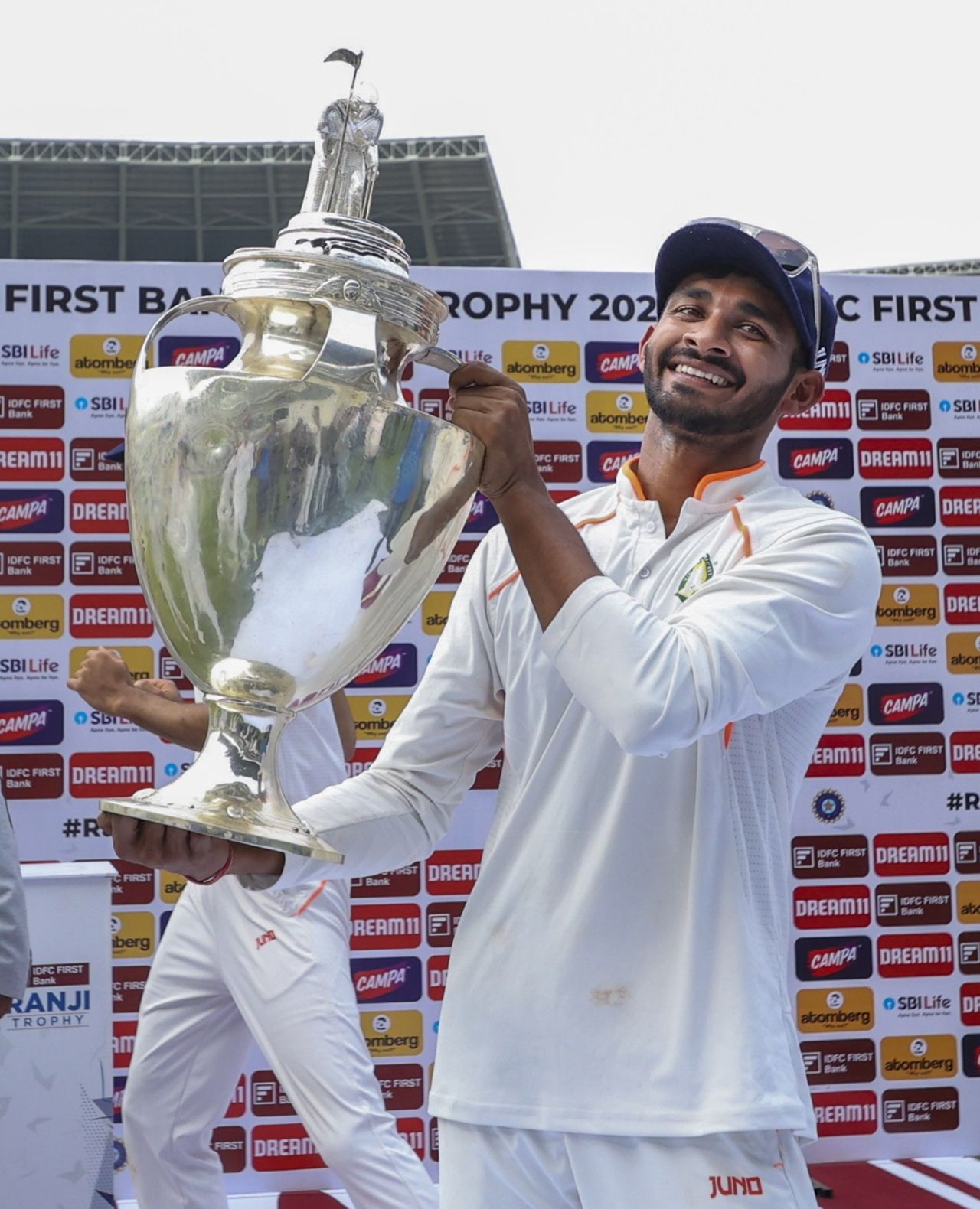 Vidarbha captain Akshay Wadkar with the trophy | Cricinfo.com