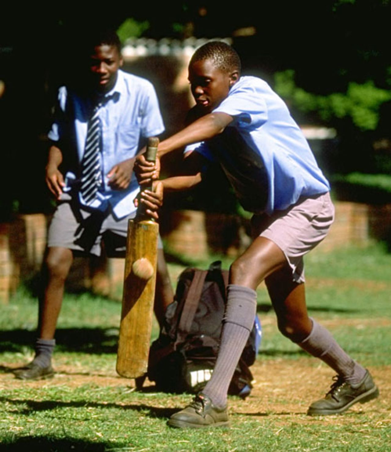 Children playing cricket in Zimbabwe, November 1996