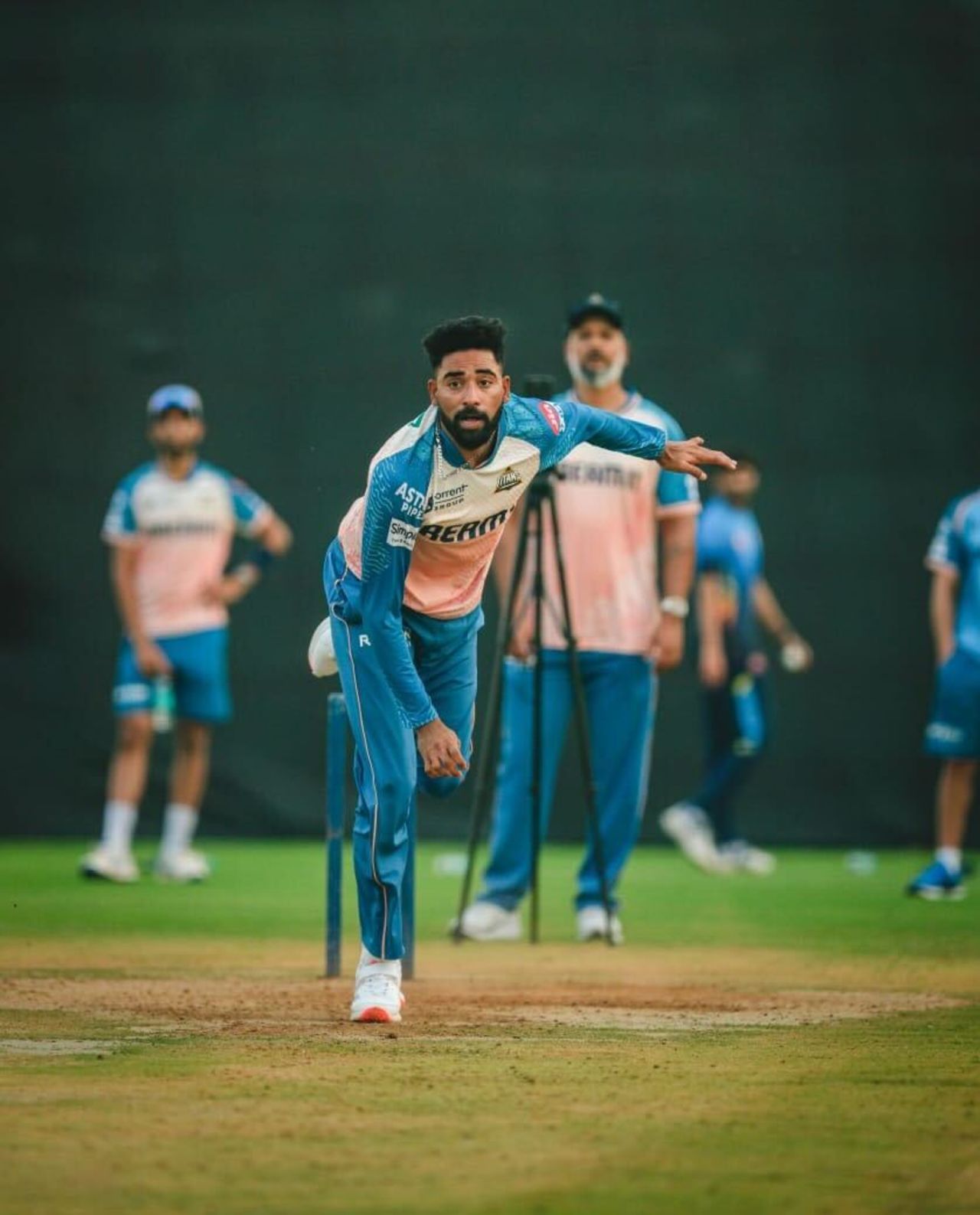 Mohammed Siraj bowls during a Gujarat Titans training session, IPL 2025, Ahmedabad, March 12, 2025