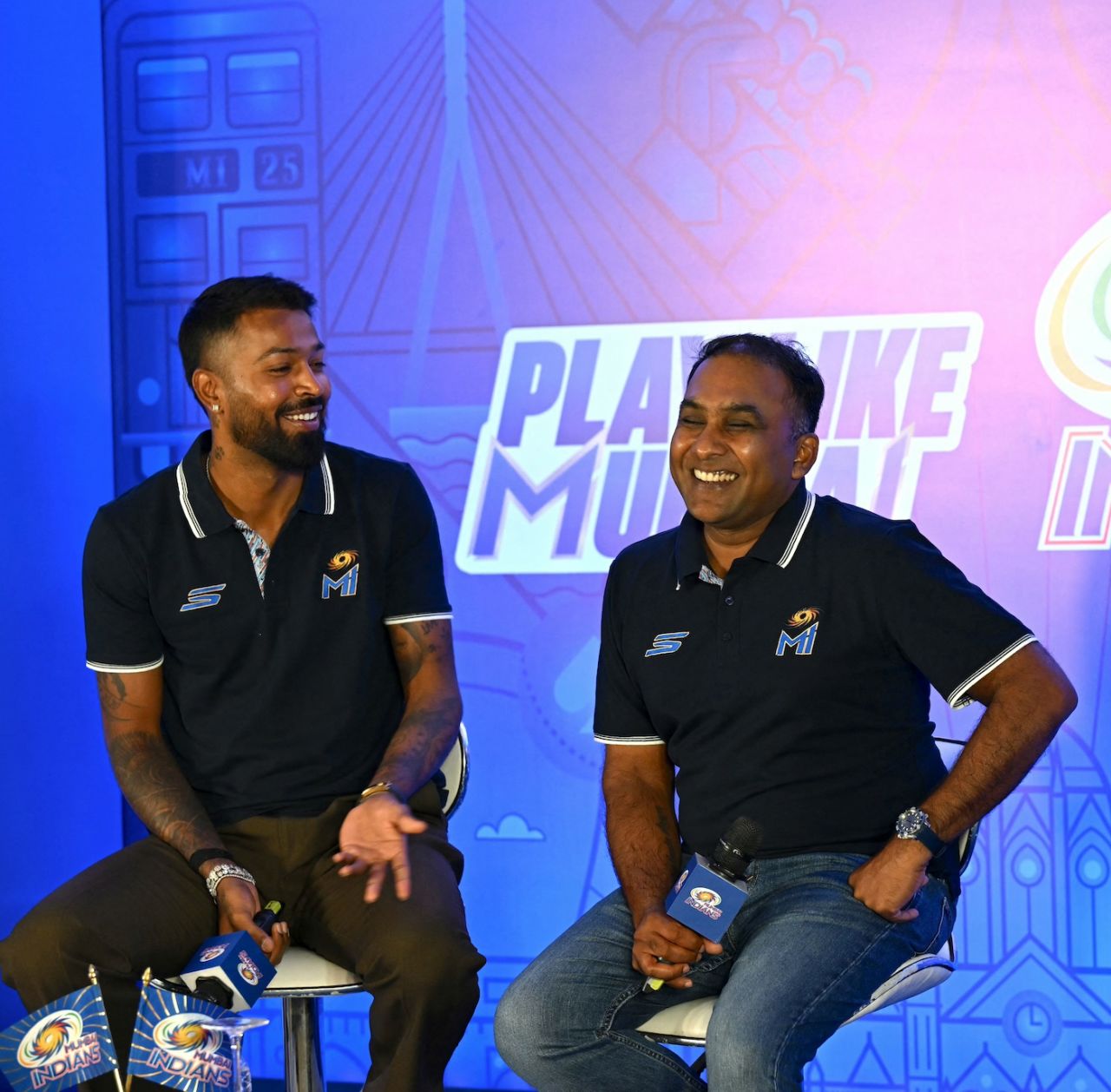 Hardik Pandya and Mahela Jayawardene share a laugh at a press meet, Mumbai, March 19, 2025