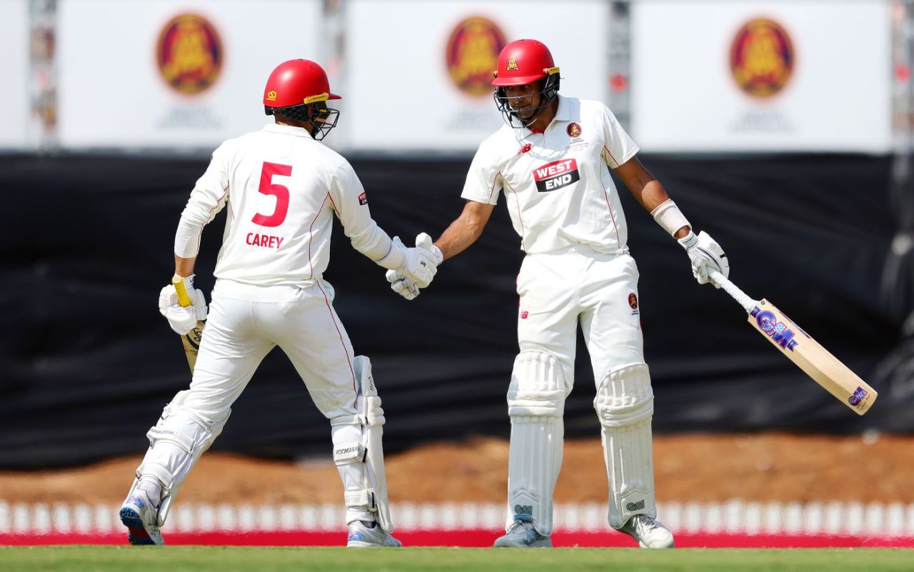 Jason Sangha is congratulated by Alex Carey after reaching 50, South Australia vs Queensland, Sheffield Shield final, Karen Rolton Oval, March 29, 2025