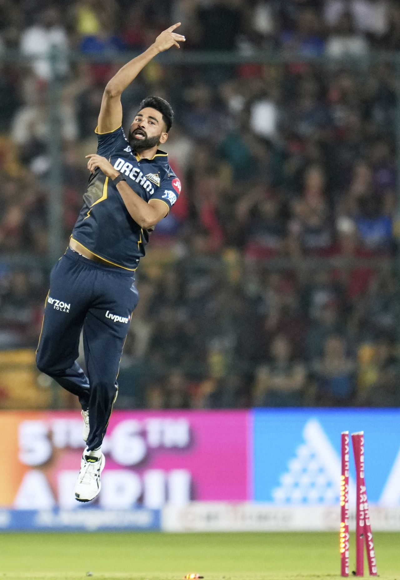 Mohammed Siraj takes flight after striking in the powerplay, Royal Challengers Bengaluru vs Gujarat Titans, IPL 2025, Bengaluru, April 2, 2025