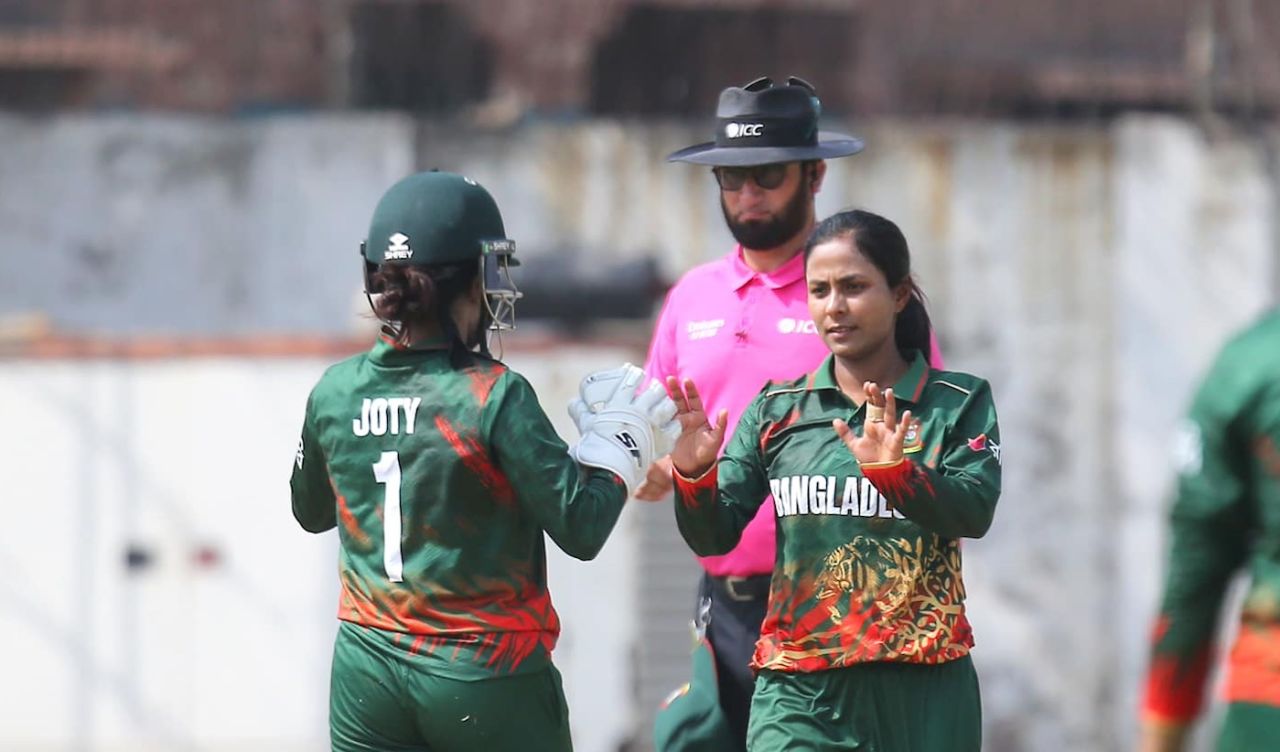 Jannatul Ferdus celebrates one of her five wickets with her captain, Bangladesh vs Thailand, Women's World Cup Qualifiers, Lahore, April 10, 2025