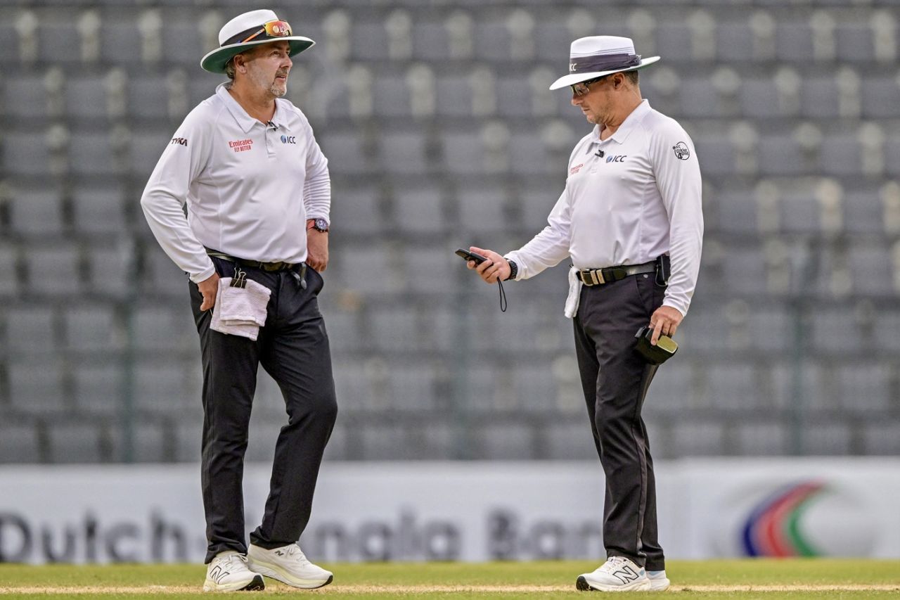 Umpires Richard Illingworth and Richard Kettleborough take out the light meter, Bangladesh vs Zimbabwe, 1st Test, Sylhet, 3rd day, April 22, 2025