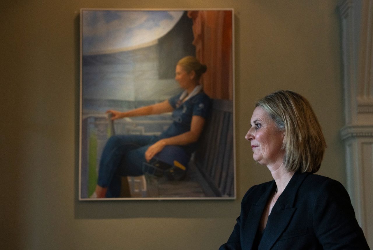 Charlotte Edwards poses in front of her portrait in the Long Room at Lord's, April 24, 2025