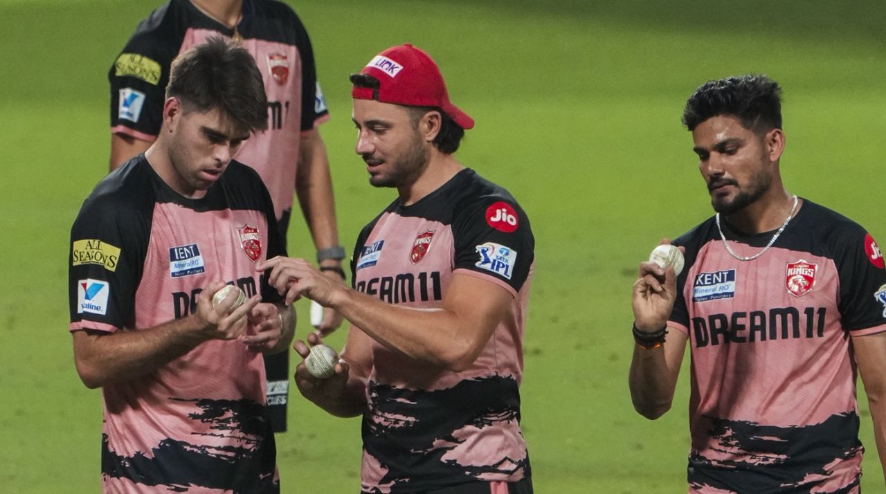 Marcus Stoinis has a chat with Xavier Bartlett during a training session, Kolkata, April 24, 2024