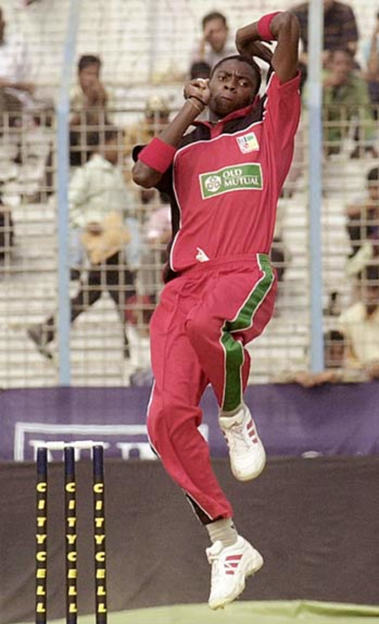 Chris Mpofu bowling, Bangladesh v Zimbabwe, Chittagong, January 24, 2005