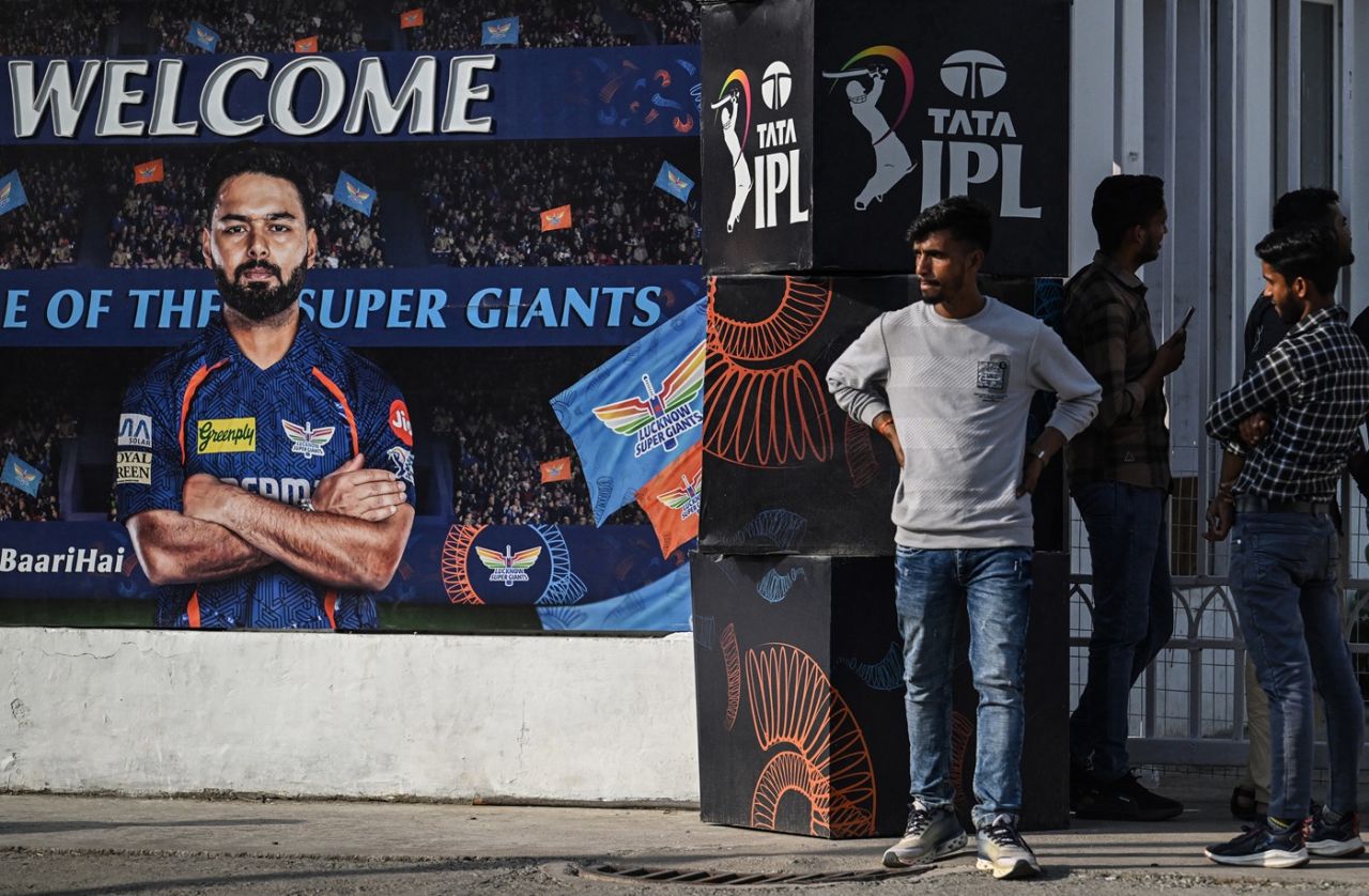 Fans stand outside the Ekana Stadium after the IPL was suspended for a week, Lucknow, May 9, 2025