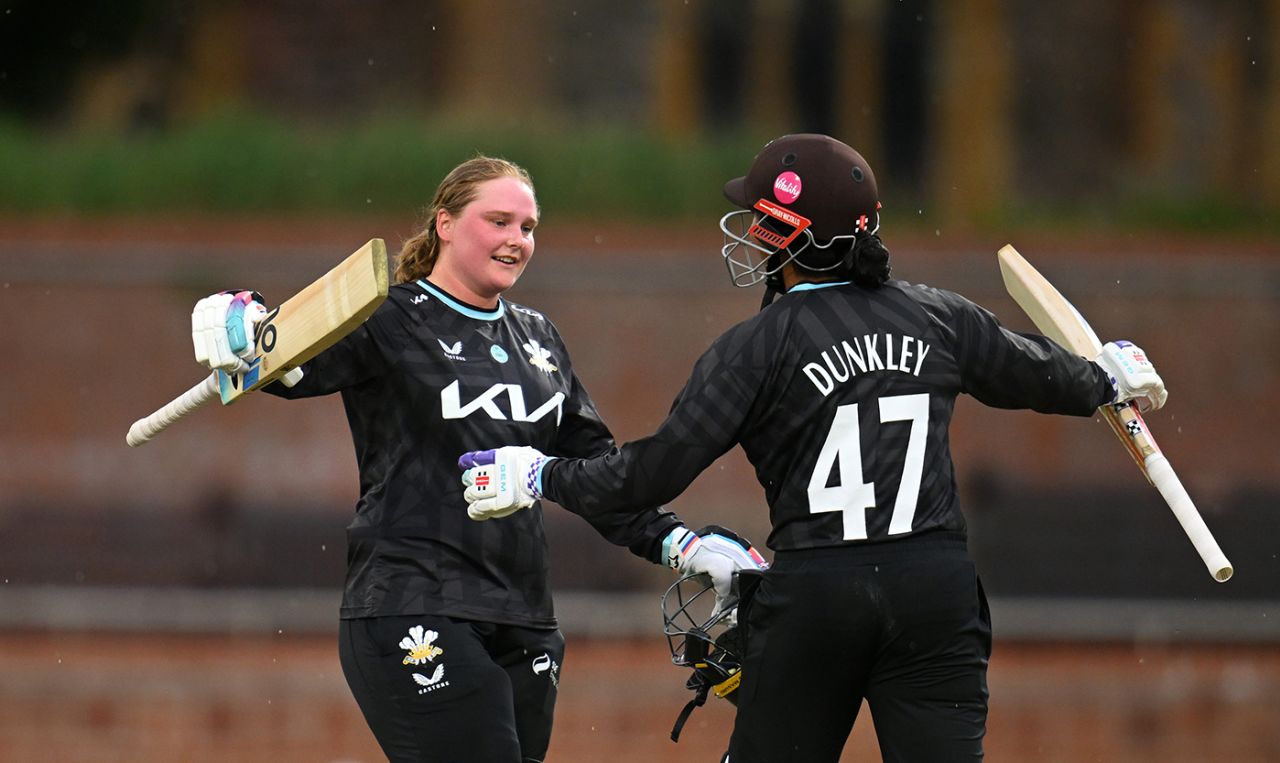 Bryony Smith celebrates her century with team-mate Sophia Dunkley, Metro Bank One Day Cup, Somerset vs Surrey, Taunton, May 11, 2025