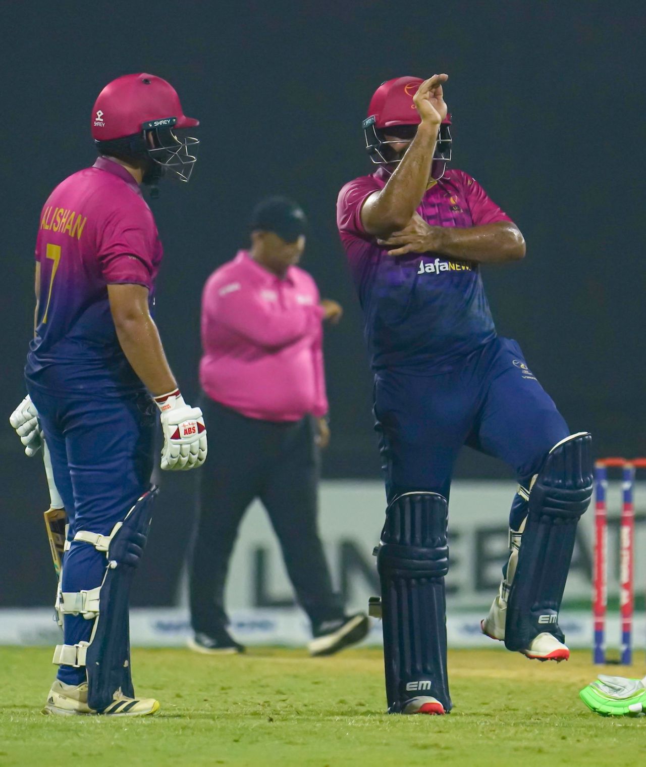 Asif Khan does the snake gesture as Alishan Sharafu looks on after hitting the winning runs, UAE vs Bangladesh, 3rd T20I, Sharjah, May 21, 2023