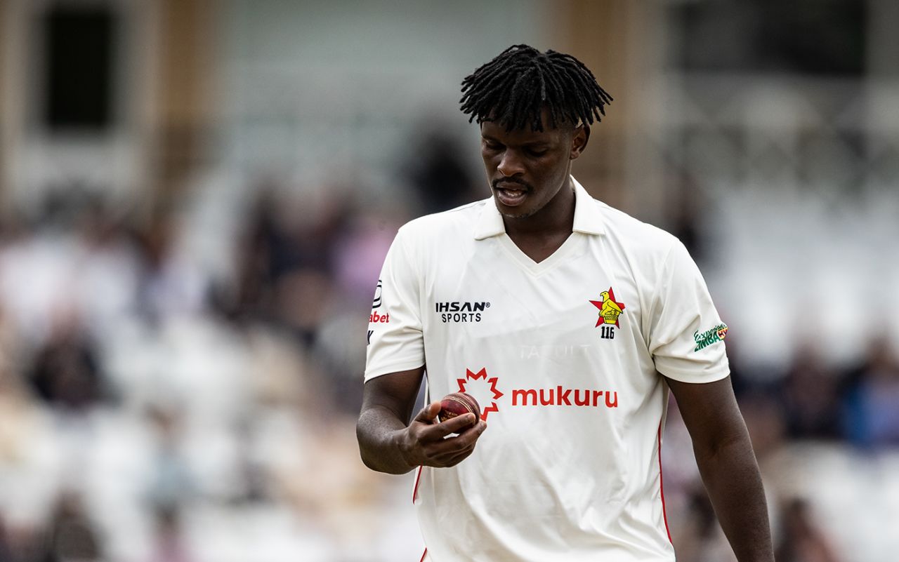 Richard Ngarava inspects the Dukes ball, England vs Zimbabwe, Trent Bridge, 1st day, May 22, 2025