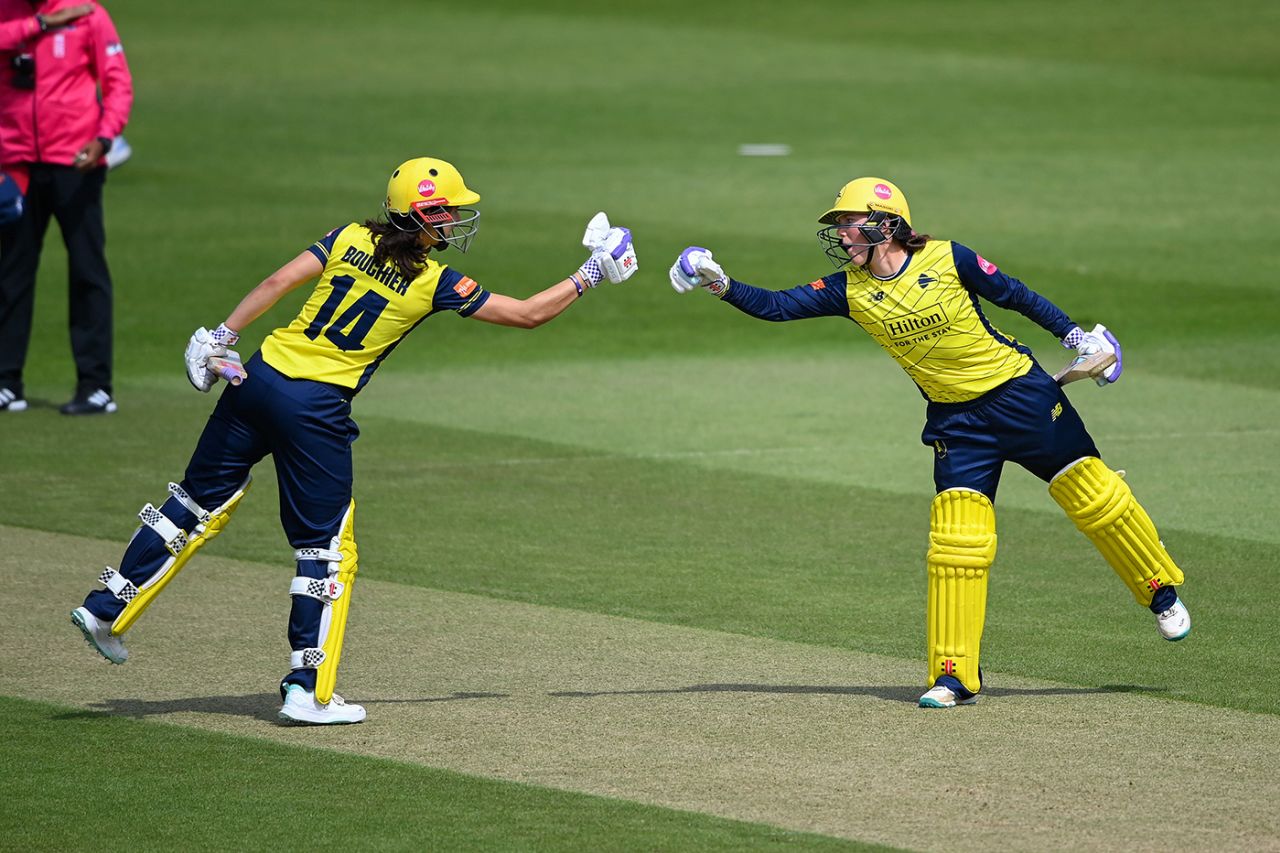 Maia Bouchier and Ella McCaughan punch gloves during their stand, Hampshire vs Essex, Women's T20 Blast, Utilita Bowl, May 30, 2025