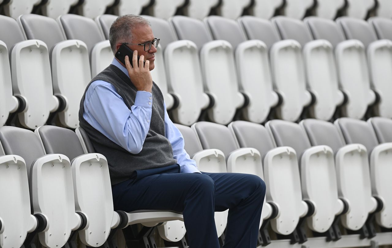 ECB chief executive Richard Gould talks on the phone