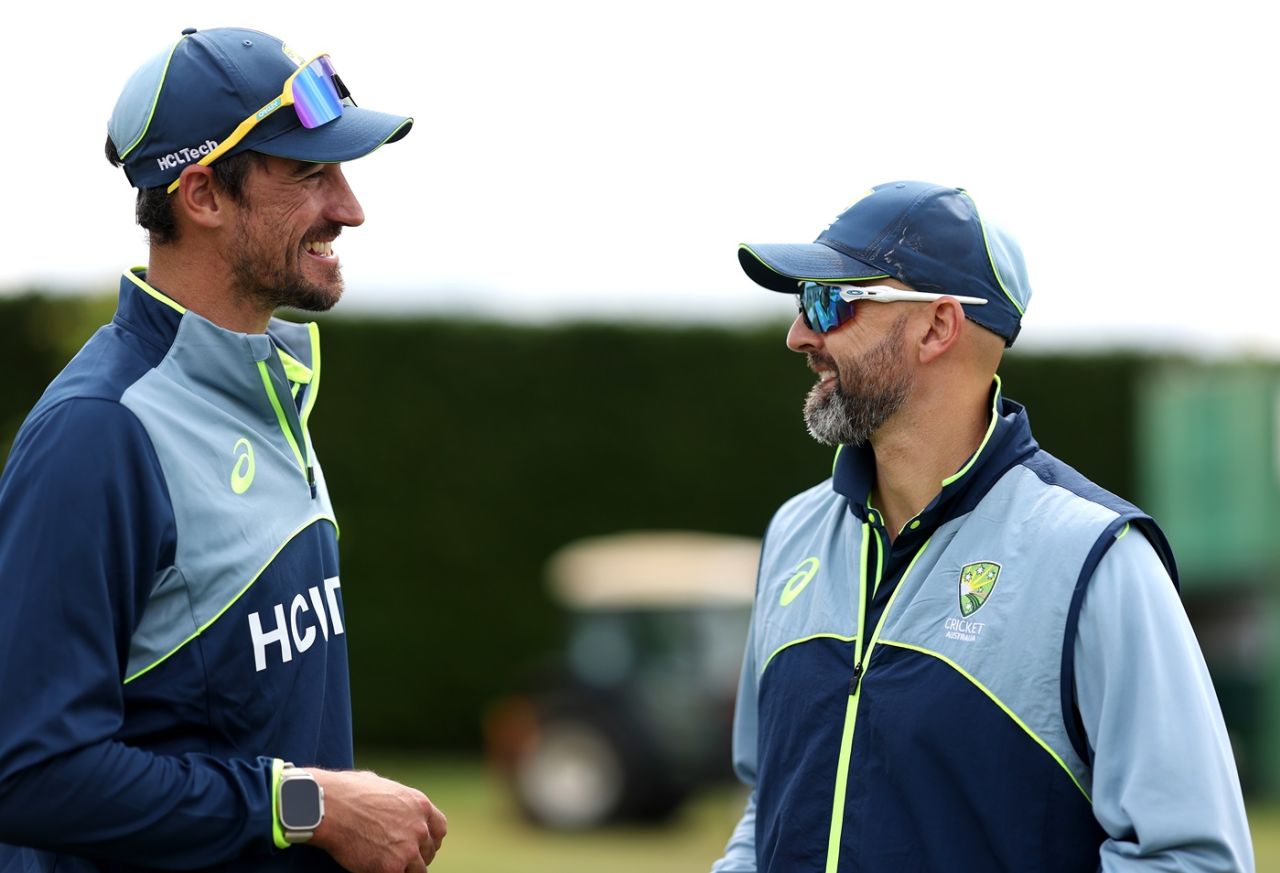 Mitchell Starc has a chat with Nathan Lyon, Beckenham, June 6, 2025