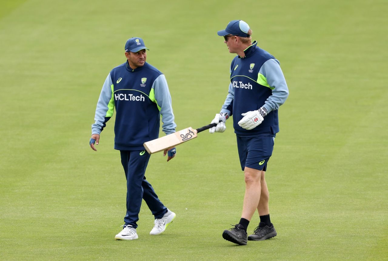 Usman Khawaja and Andrew McDonald have a chat during training, London, June 9, 2025