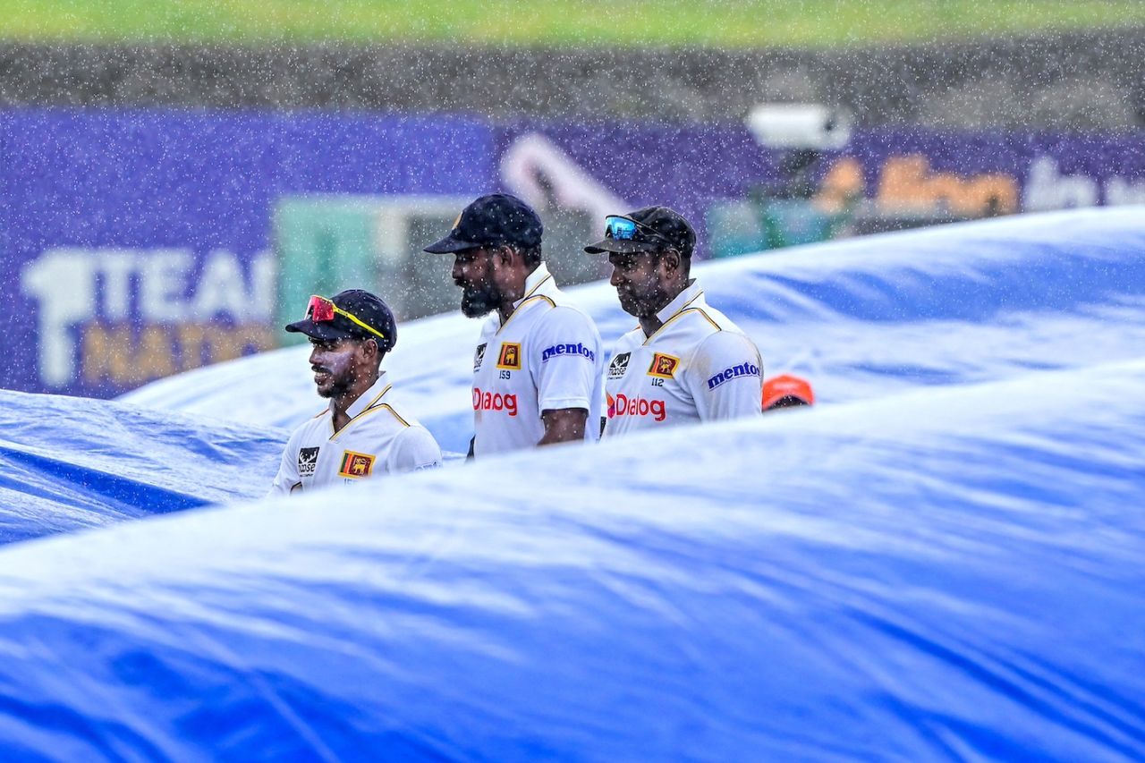 The Sri Lanka players walk off the field as the covers come on, Sri Lanka vs Bangladesh, 1st Test, Galle, 5th day, June 21, 2025