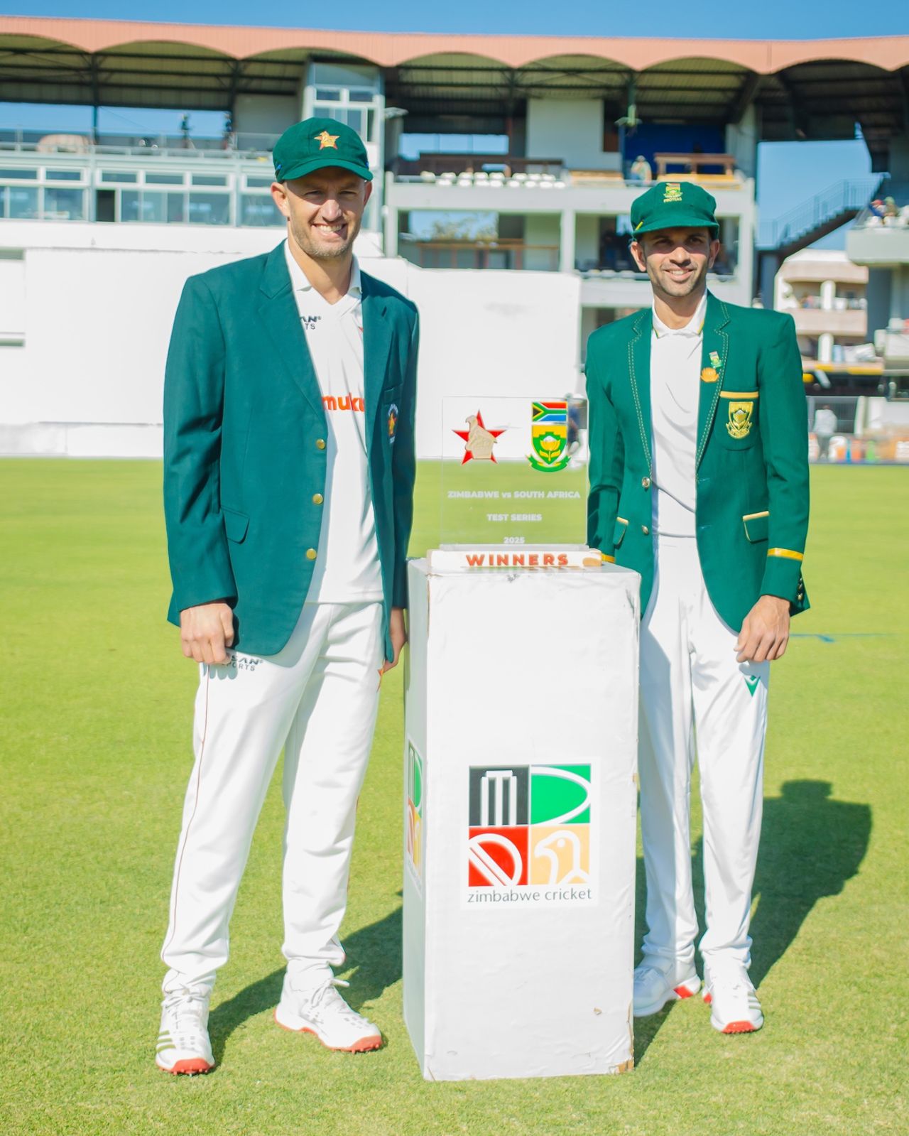 Captains Craig Ervine and Keshav Maharaj pose with the series trophy, Zimbabwe vs South Africa, 1st Test, day 1, Bulawayo, June 28, 2025