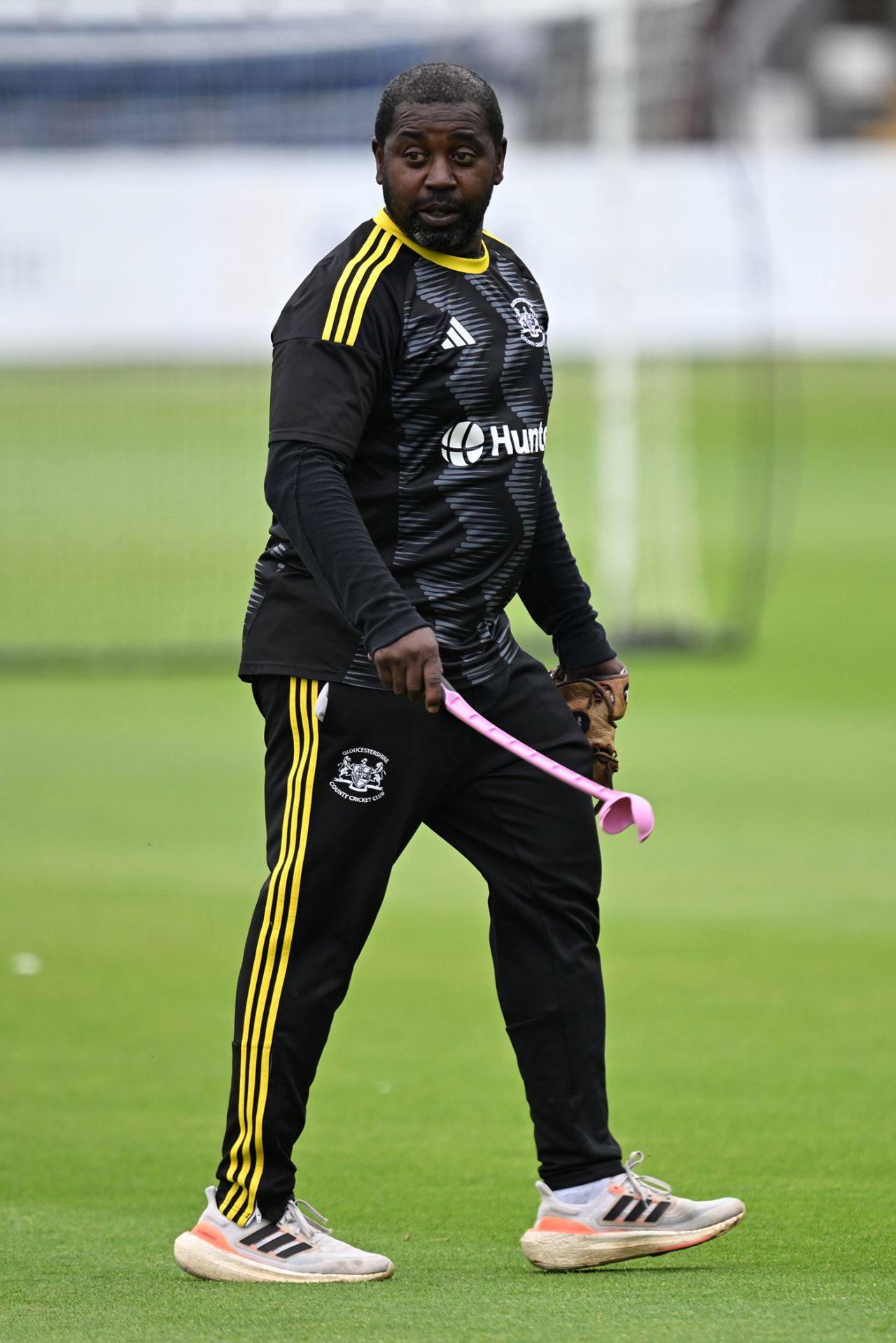 Mark Alleyne with his dog thrower before play, Glamorgan vs Gloucestershire, Cardiff, June 30, 2025