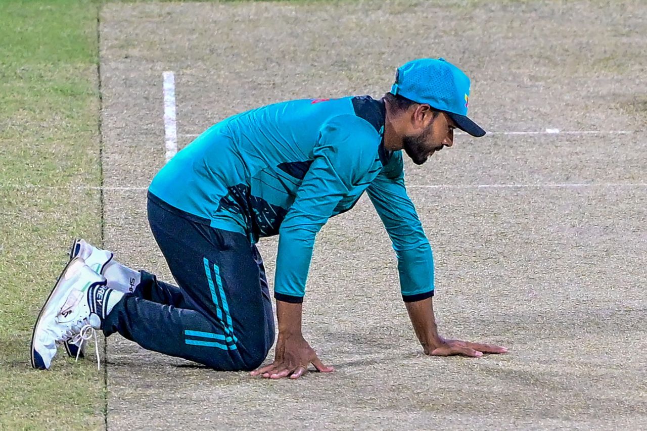 Mehidy Hasan Miraz inspects the Khettarama pitch, Colombo, July 1, 2025