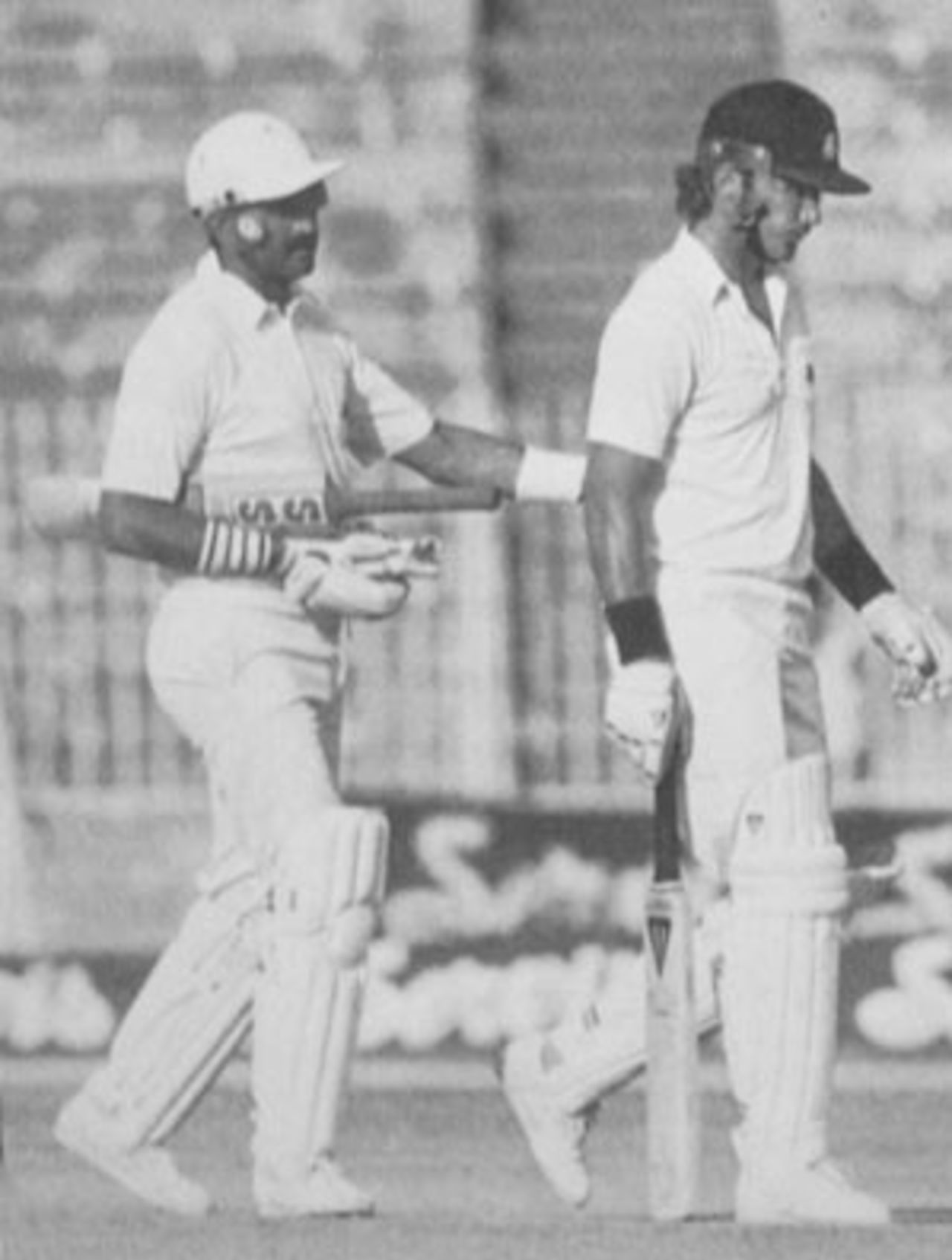 Graham Gooch ushers a reluctant Chris Broad off, Pakistan v England, 1st Test, Lahore, November 1987