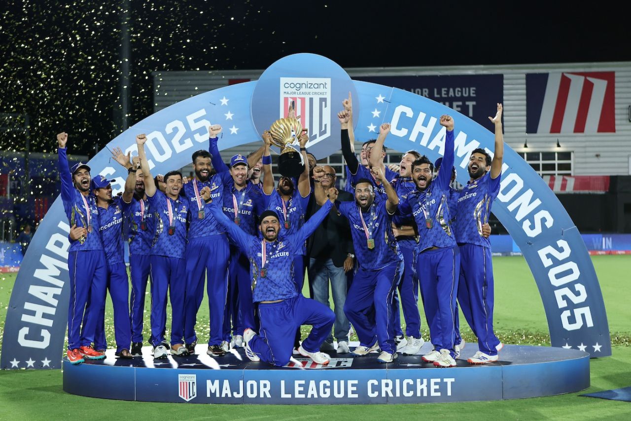 Nicholas Pooran holds up the trophy as his teammates celebrate, MI New York vs Washington Freedom, MLC 2025 final, Dallas, July 13, 2025
