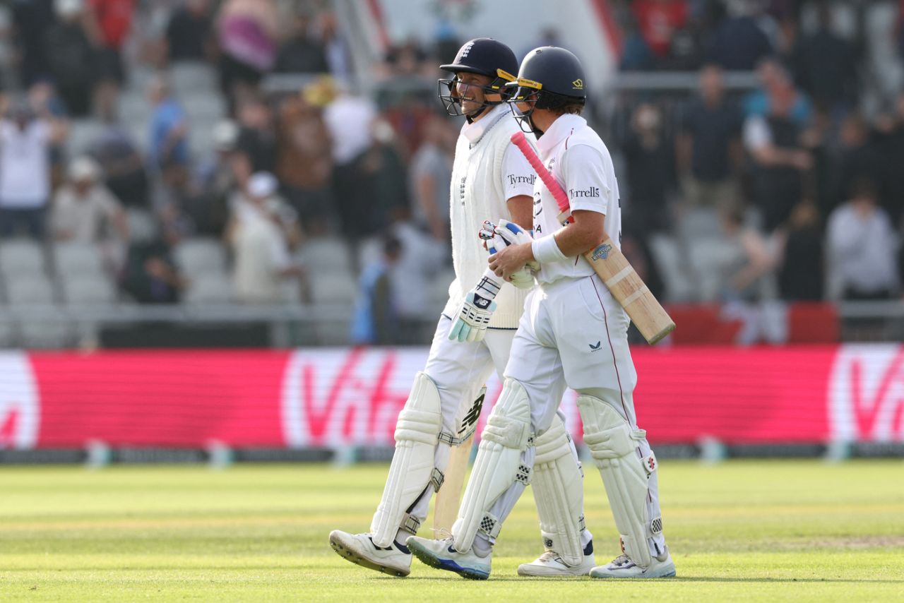 Joe Root and Ollie Pope walk off after the day's play, England vs India, 4th Test, 2nd Day, Manchester, July 24, 2025 