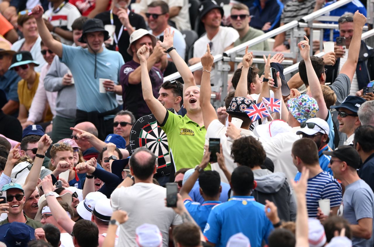 A patron wearing the Michael van Gerwen shirt parties in the stands, England vs India, 4th Test, Manchester, 4th day, July 26, 2025