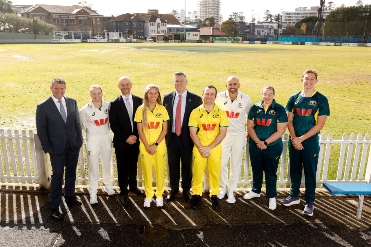 (From left to right) Mike Baird, Alyssa Healy, Todd Greenberg, Courtney Webeck, Westpac CEO Anthony Miller, Steffan Nero, Nathan Lyon, Christina Coulson and Charlie Anderson pose during a Cricket Australia Partnership Announcement at Manly Oval in Sydney