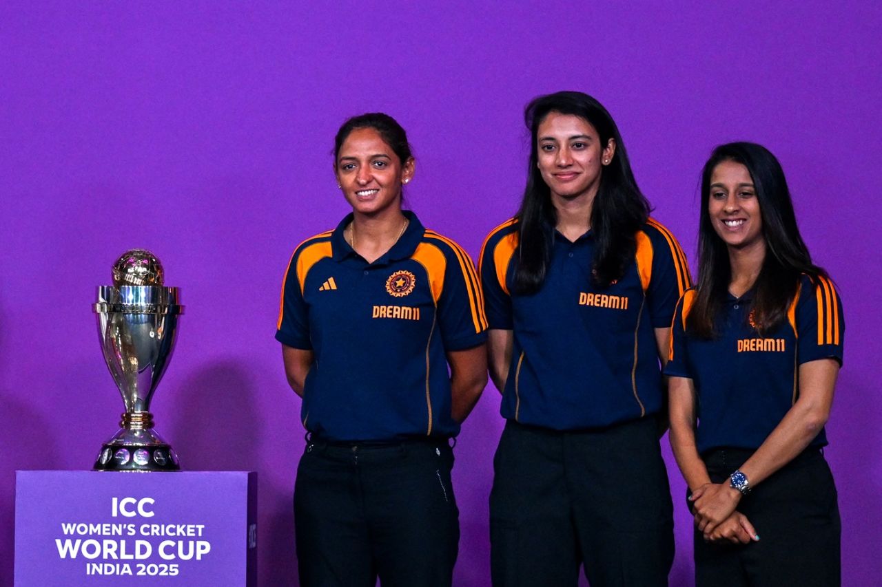 Harmanpreet Kaur, Smriti Mandhana and Jemimah Rodrigues pose with the ODI World Cup trophy, Mumbai, August 11, 2025