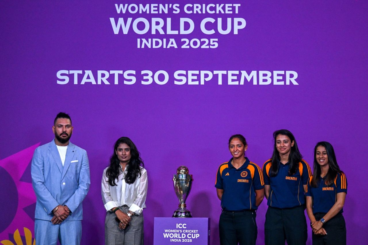 Yuvraj Singh, Mithali, Harmanpreet Kaur, Smriti Mandhana and Jemimah Rodrigues pose with the ODI World Cup trophy, Mumbai, August 11, 2025