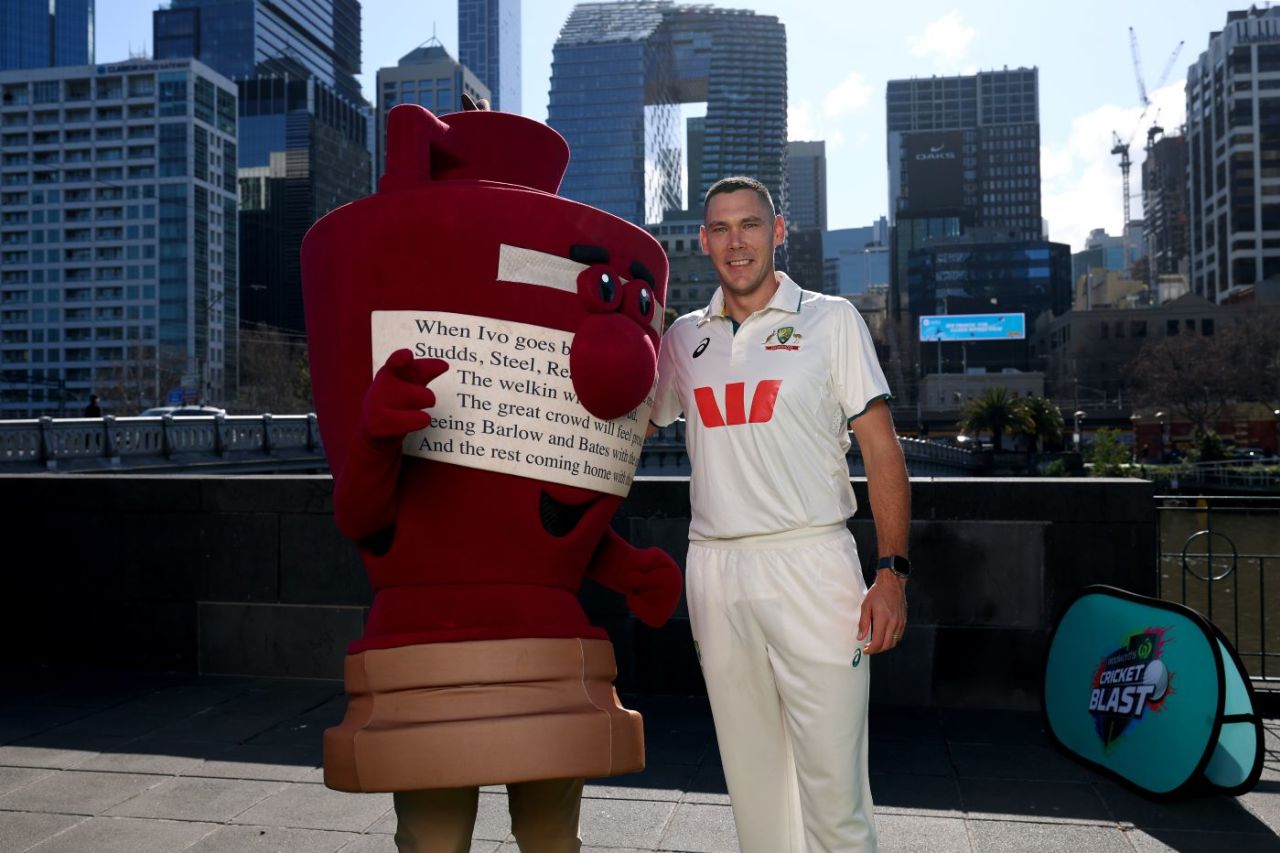 Scott Boland poses with an Ashes mascot in Melbourne