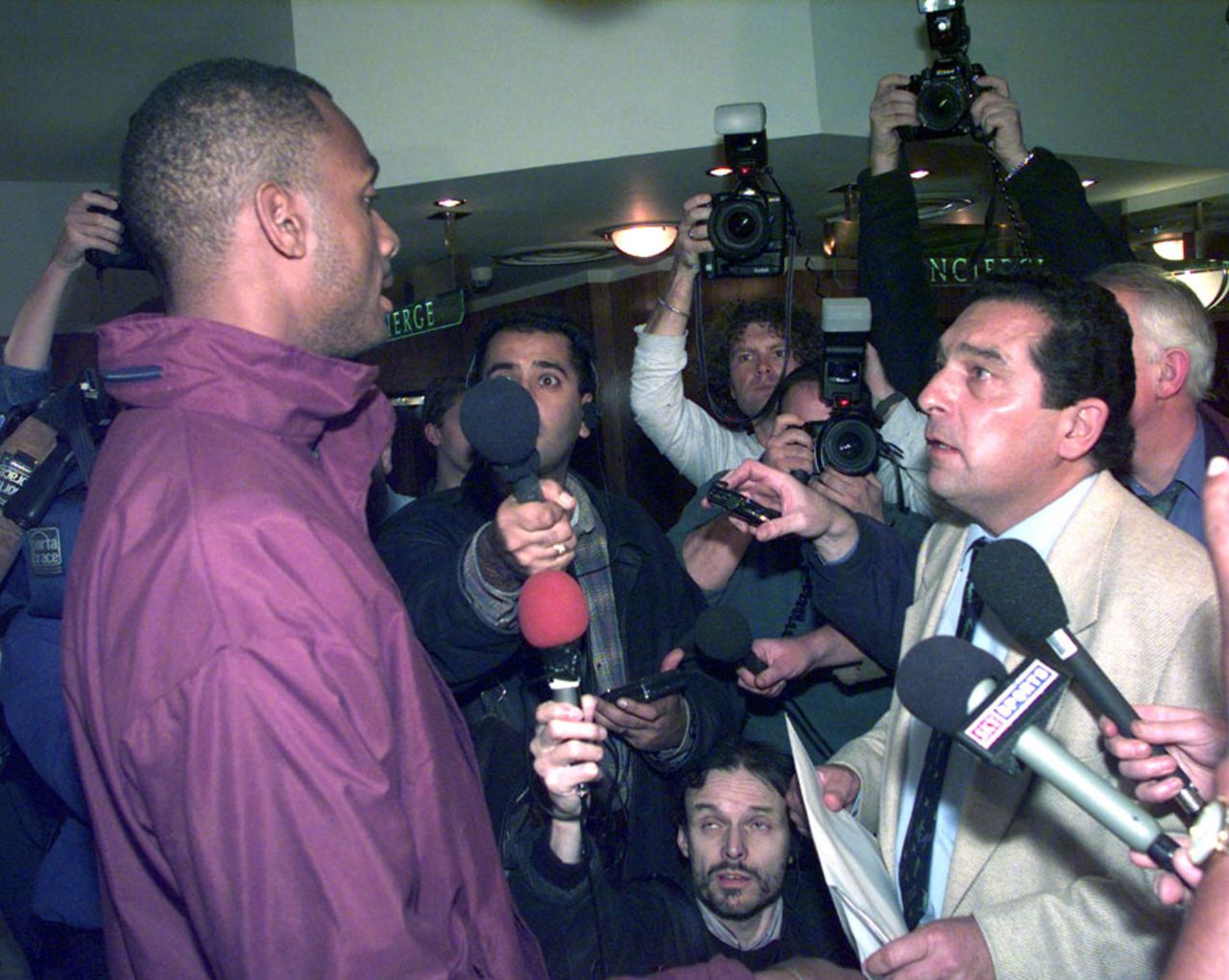 Dr Ali Bacher meets Courtney Walsh as questions fly about the future of the WI tour of South Africa, London, November 6, 1998