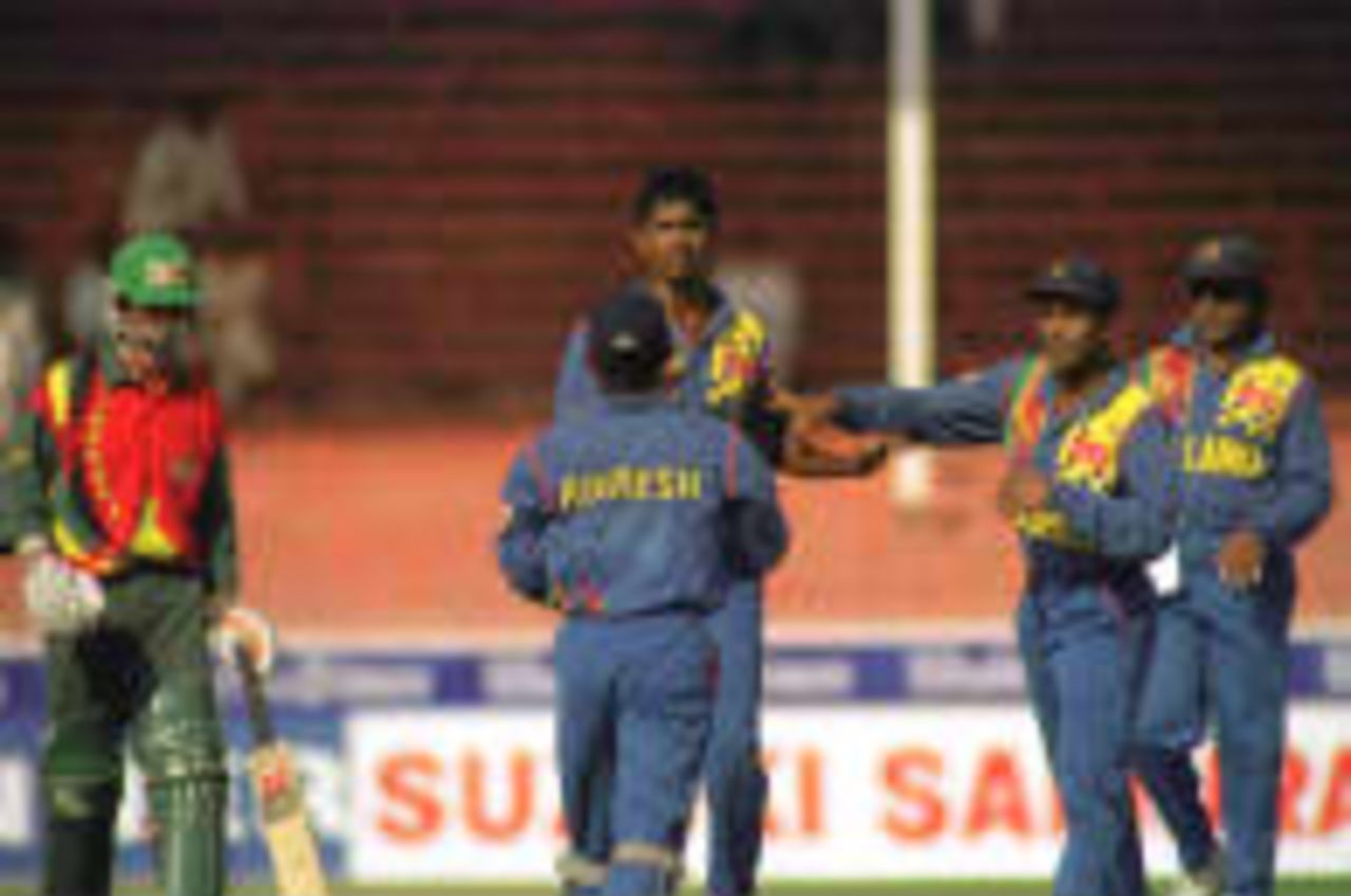 Grant Flower out to Wickremasinghe Coca-Cola Champions Trophy, 1998/99 5th Match Sri Lanka v Zimbabwe Sharjah C.A. Stadium  10 November 1998